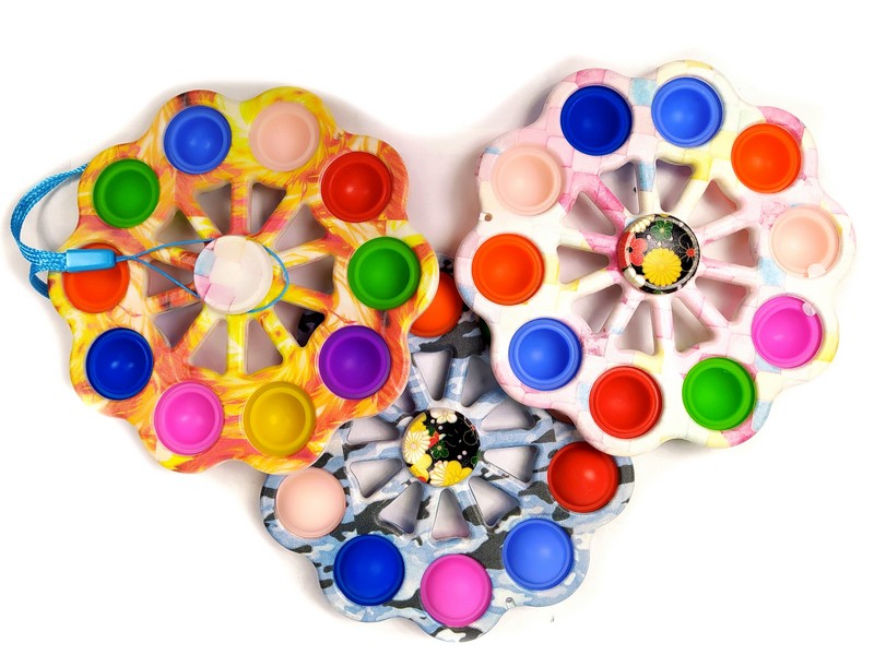 Донецк игрушка оптом АНТИСТРЕСС-СПИННЕР СИМПЛ ДИМПЛ ЦВЕТНОЙ СРЕДНИЙ 10 ПУПЫРОК KF-7