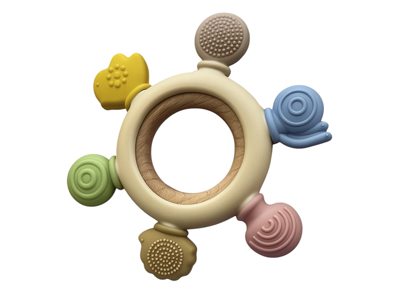 Прорезыватель силиконовый с кольцом из бука "Штурвал"